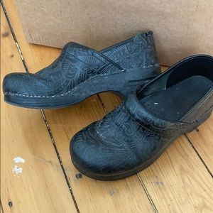 Dansko tooled leather clogs